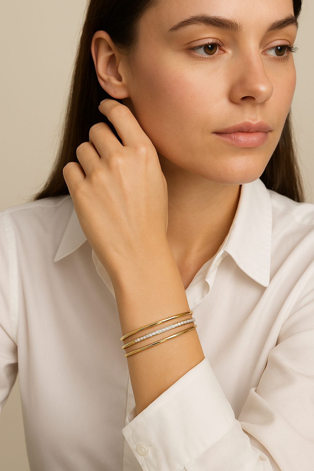 A refined take on a classic silhouette, the Diamond Twist Bangle is crafted in solid 18K gold and set with natural diamonds. The sculpted twist design adds a modern edge, while the adjustable fit ensures comfort and ease of wear.
Available in yellow gold, white gold, and rose gold, this piece is perfect worn alone or stacked for a layered look. on model