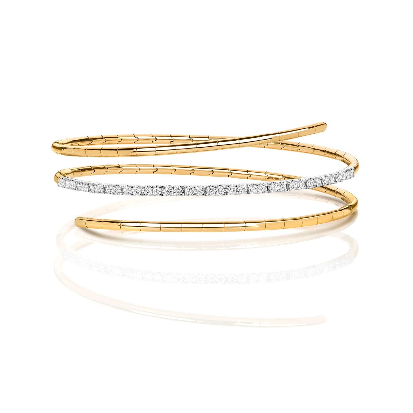 A refined take on a classic silhouette, the Diamond Twist Bangle is crafted in solid 18K gold and set with natural diamonds. The sculpted twist design adds a modern edge, while the adjustable fit ensures comfort and ease of wear.
Available in yellow gold, white gold, and rose gold, this piece is perfect worn alone or stacked for a layered look.