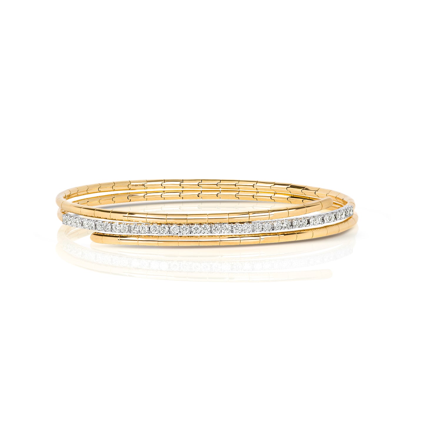 A refined take on a classic silhouette, the Diamond Twist Bangle is crafted in solid 18K gold and set with natural diamonds. The sculpted twist design adds a modern edge, while the adjustable fit ensures comfort and ease of wear.
Available in yellow gold, white gold, and rose gold, this piece is perfect worn alone or stacked for a layered look.