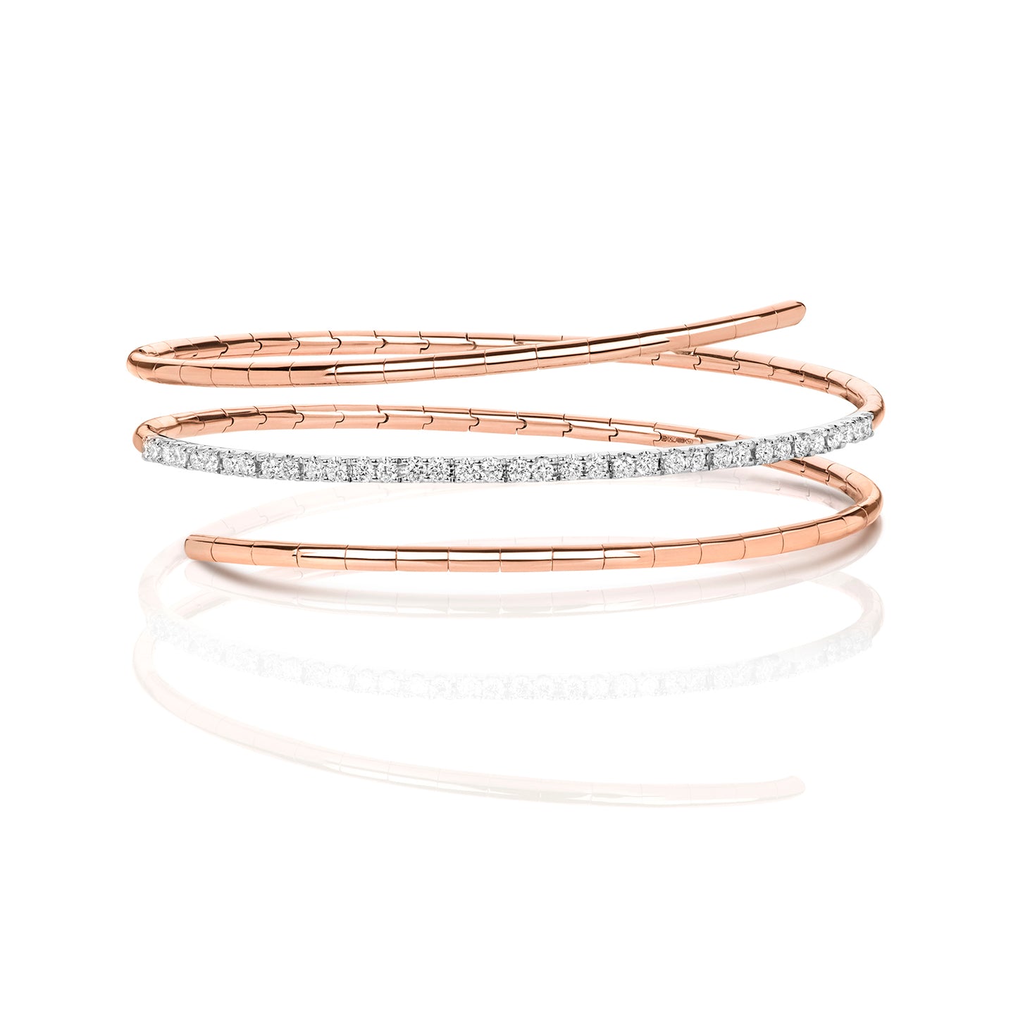 A refined take on a classic silhouette, the Diamond Twist Bangle is crafted in solid 18K gold and set with natural diamonds. The sculpted twist design adds a modern edge, while the adjustable fit ensures comfort and ease of wear.
Available in yellow gold, white gold, and rose gold, this piece is perfect worn alone or stacked for a layered look.
