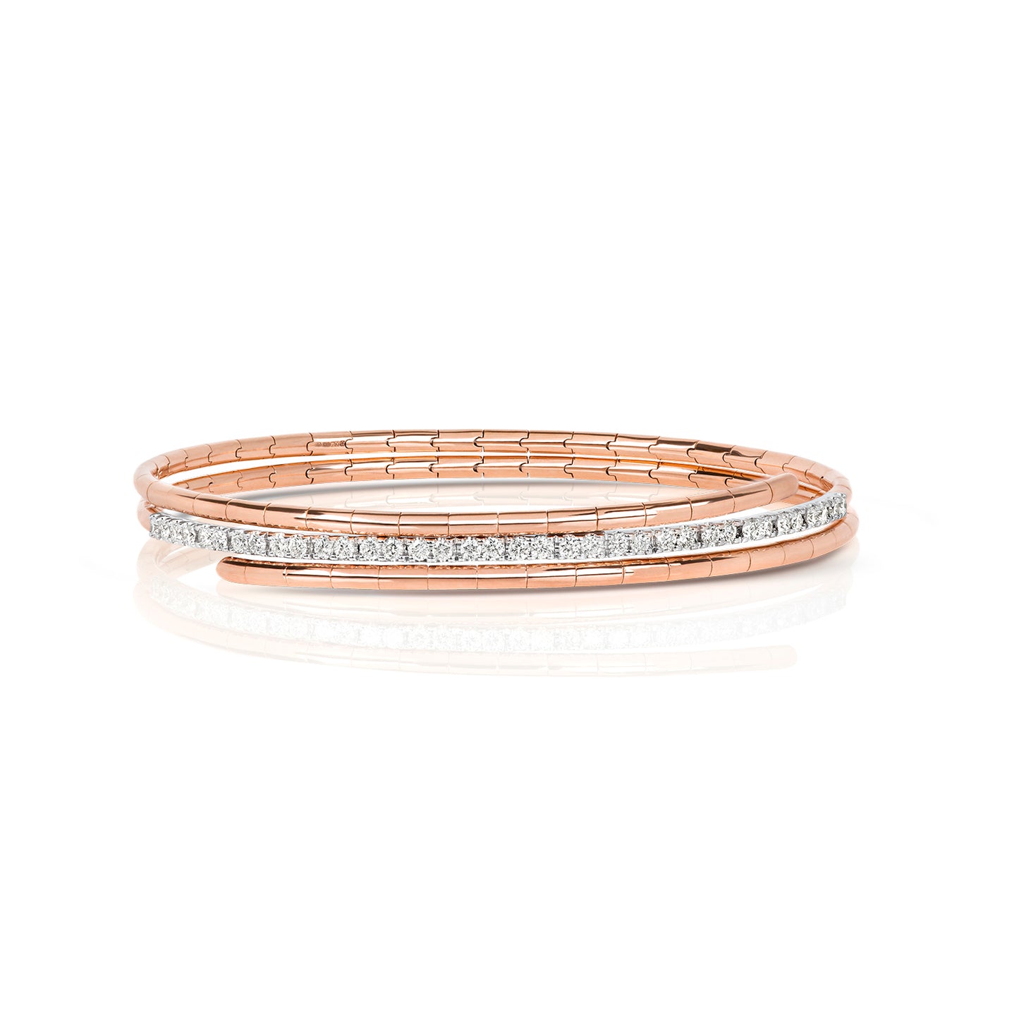 A refined take on a classic silhouette, the Diamond Twist Bangle is crafted in solid 18K gold and set with natural diamonds. The sculpted twist design adds a modern edge, while the adjustable fit ensures comfort and ease of wear.
Available in yellow gold, white gold, and rose gold, this piece is perfect worn alone or stacked for a layered look.