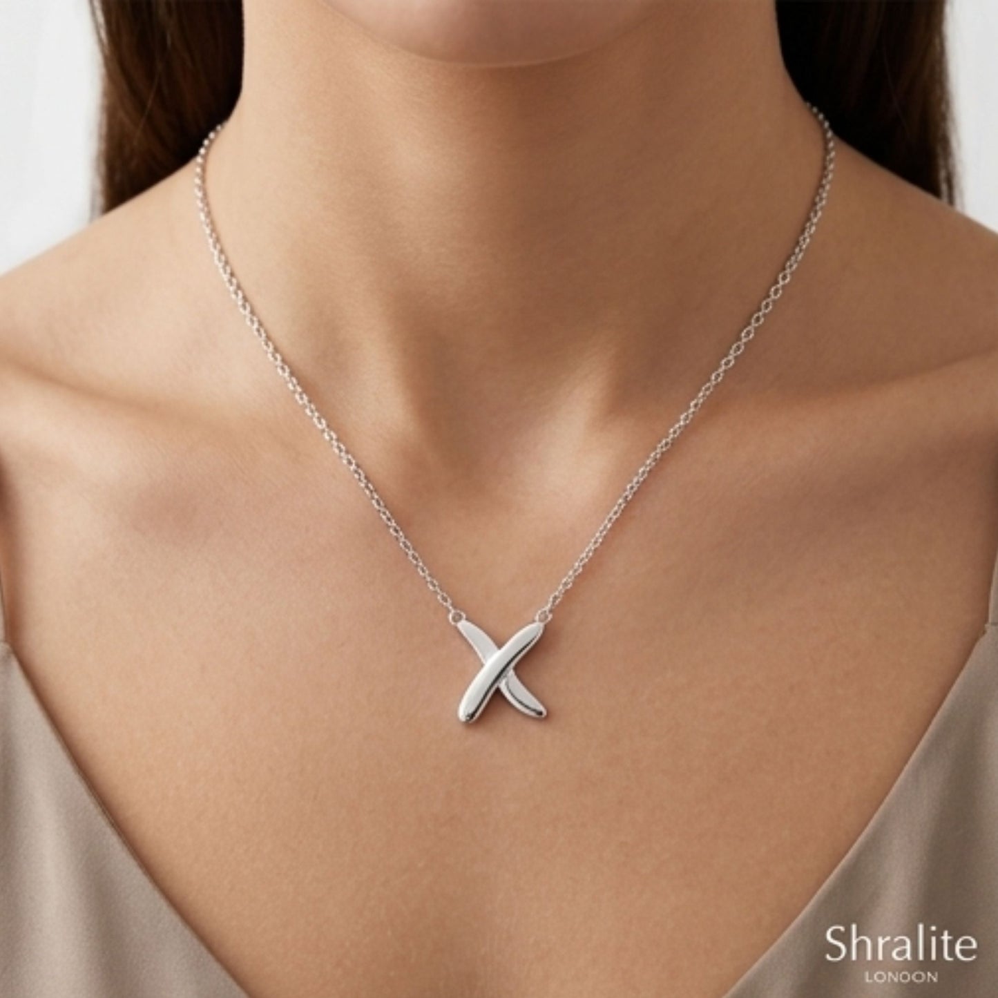 Sterling Silver Kiss Necklace.