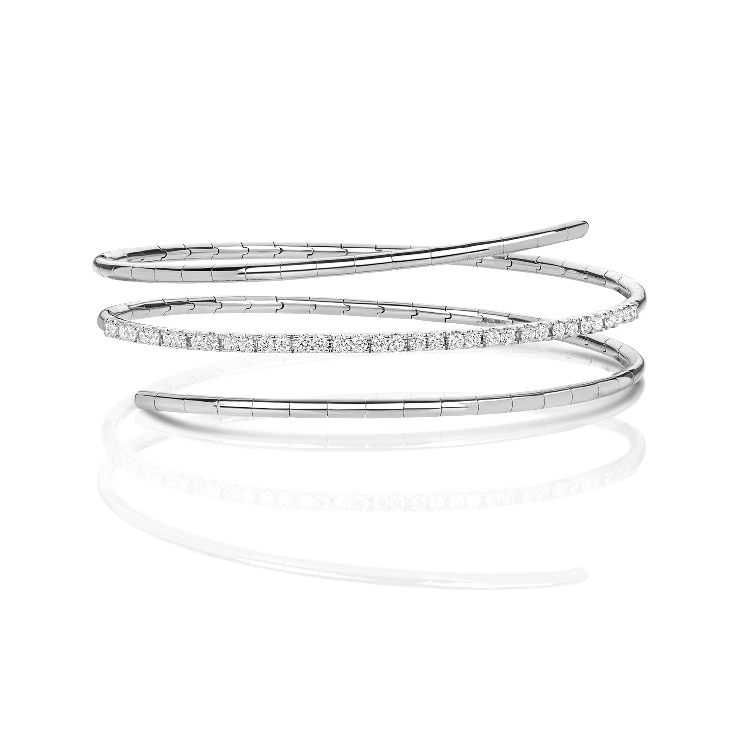 A refined take on a classic silhouette, the Diamond Twist Bangle is crafted in solid 18K gold and set with natural diamonds. The sculpted twist design adds a modern edge, while the adjustable fit ensures comfort and ease of wear.

Available in yellow gold, white gold, and rose gold, this piece is perfect worn alone or stacked for a layered look.